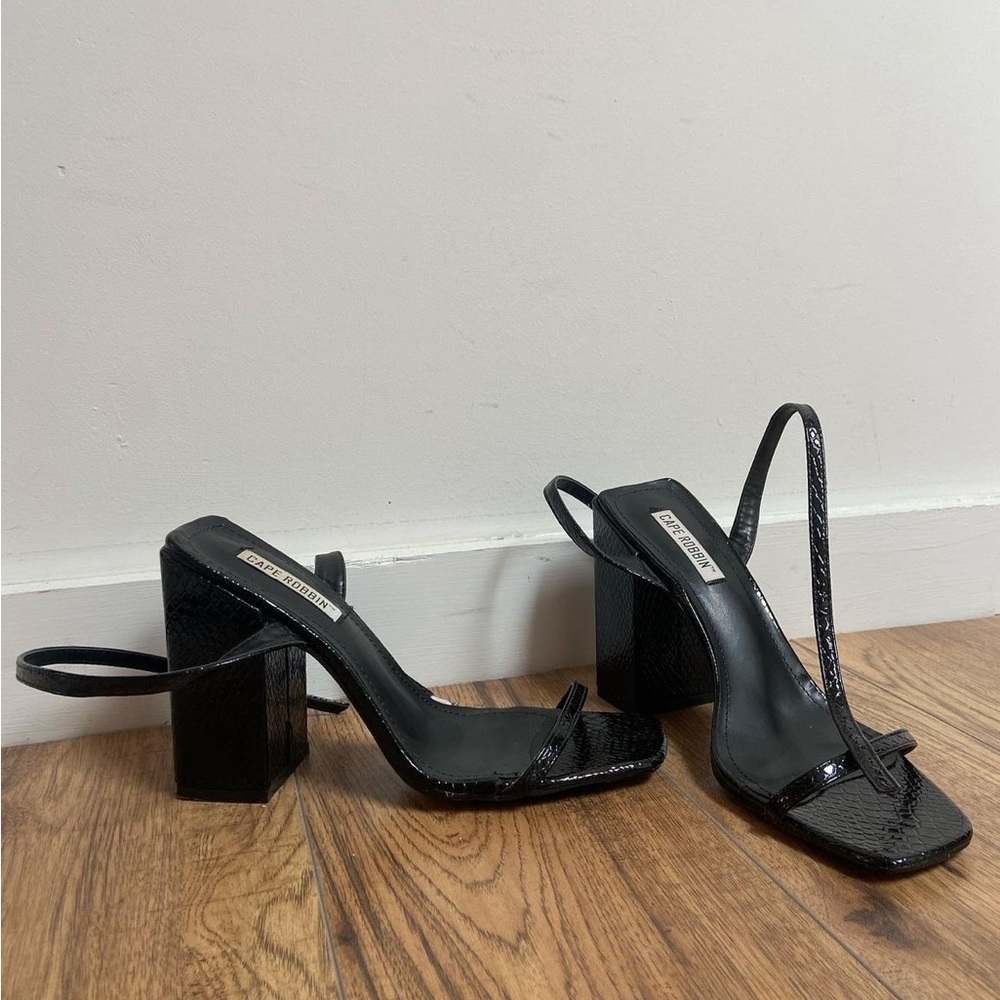 Black snakeskin heels